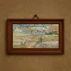 Landscape at Saint-Rémy (Enclosed Field with Peasant) (1889)-frame by Vincent van Gogh