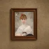 Mädchen mit weißem Tuch und Katze-frame by Charles Chaplin